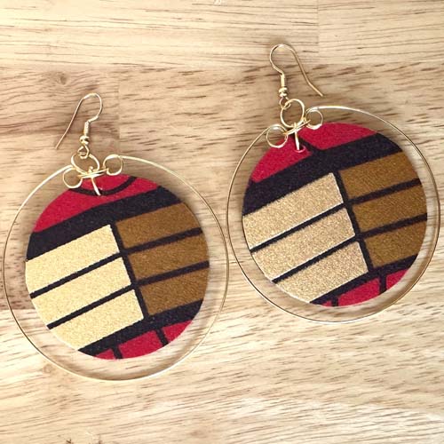 green kente bracelet and halo earrings